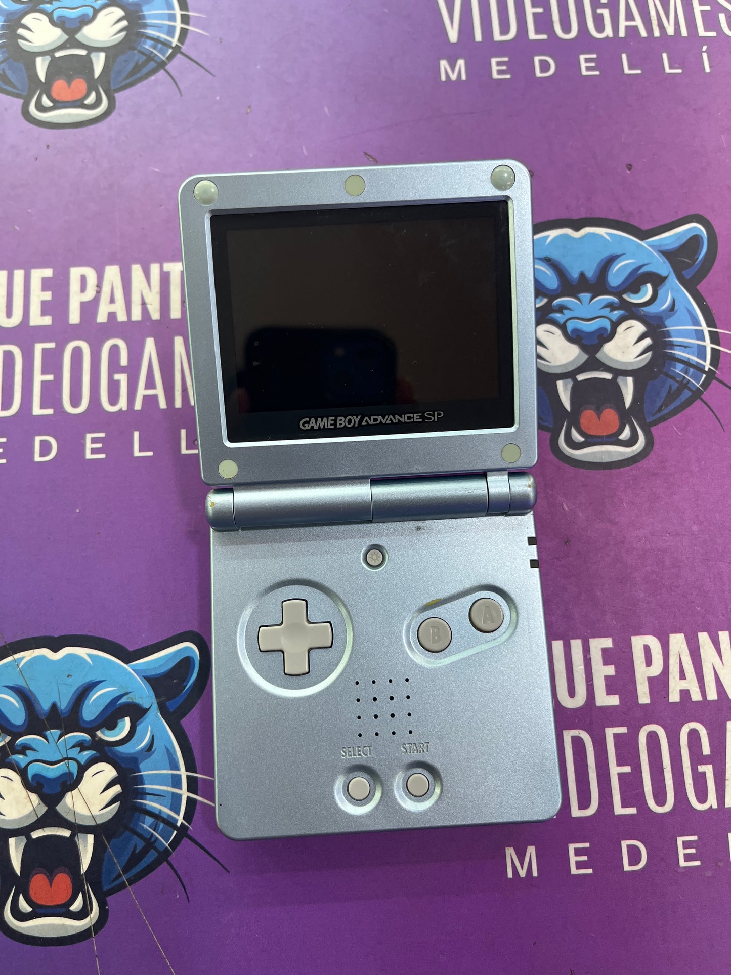 Game Boy Advance SP  101 retro iluminado azul claro con cargador