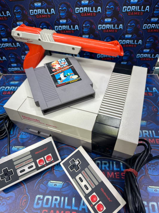 Nintendo NES. 1 control, zapper + juego