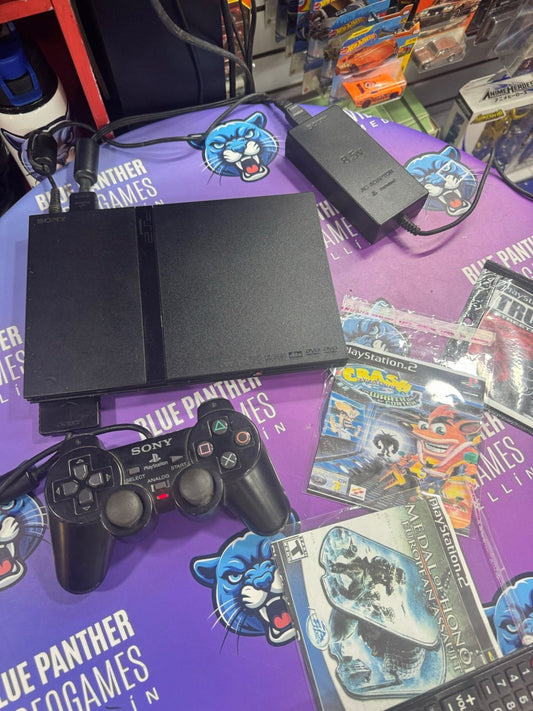 Playstation 2 Slim leyendo copias