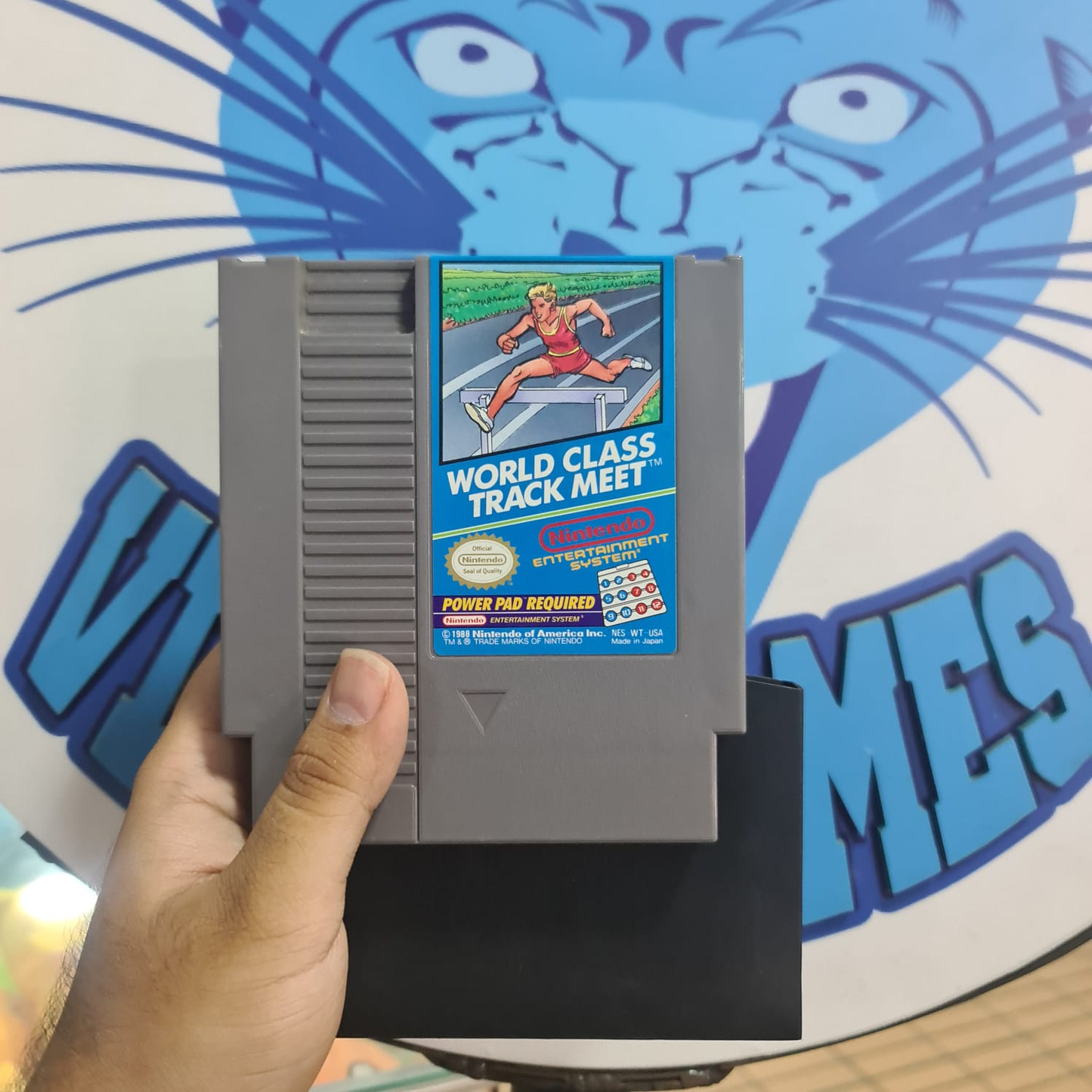 World class track meet -Nintendo nes con cubrepolvo